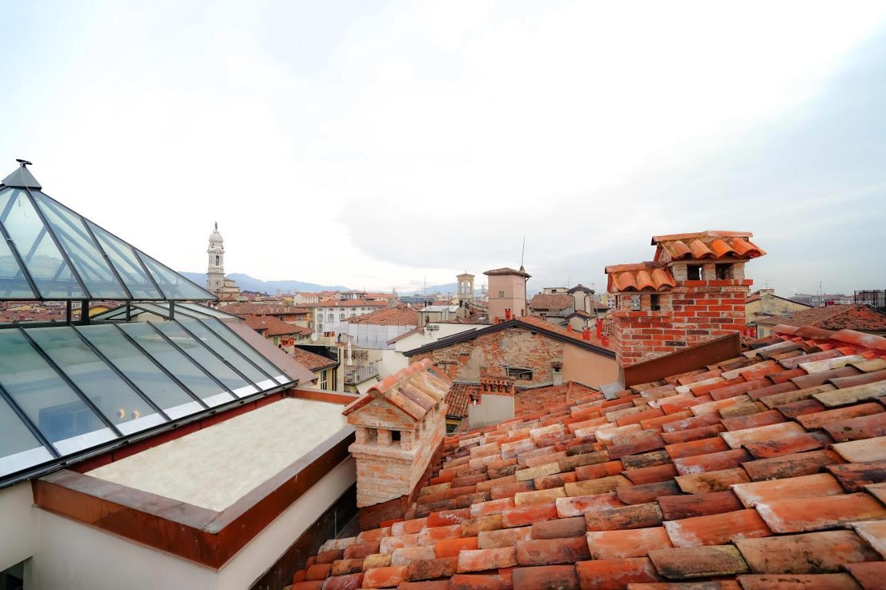 Bergamo Inn 21 Extérieur photo View of the roofs of the city
